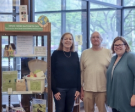 Members of the Sustainability Advisory Board pictured next to the Earth day display