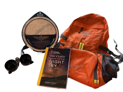Image of backpack, planisphere wide angle binoculars, and book