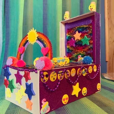 You can make a colorful float out of a shoebox!