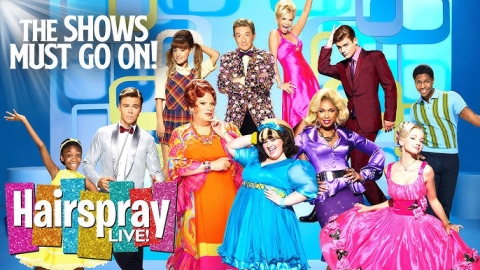 Cast of Hairspray Live posing, including Ariana Grande and Jennifer Hudson