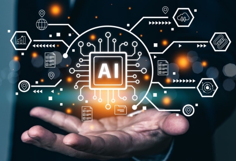 Artificial intelligence graphic showing hand with hovering technology