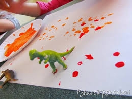 Use our dinosaurs to make dino footprints