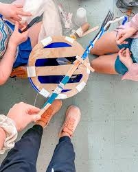 It takes skill to fish things out of the gutter!