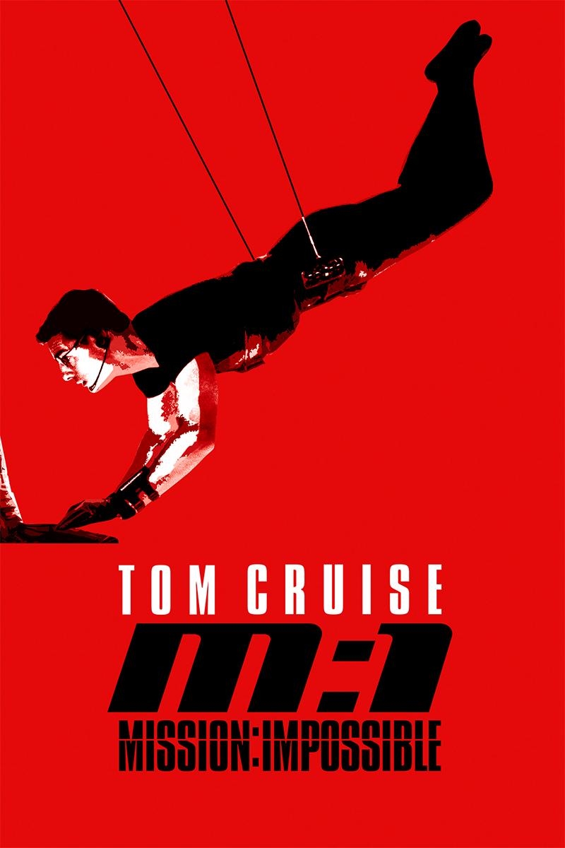 Tom Cruise using computer while suspended from wires