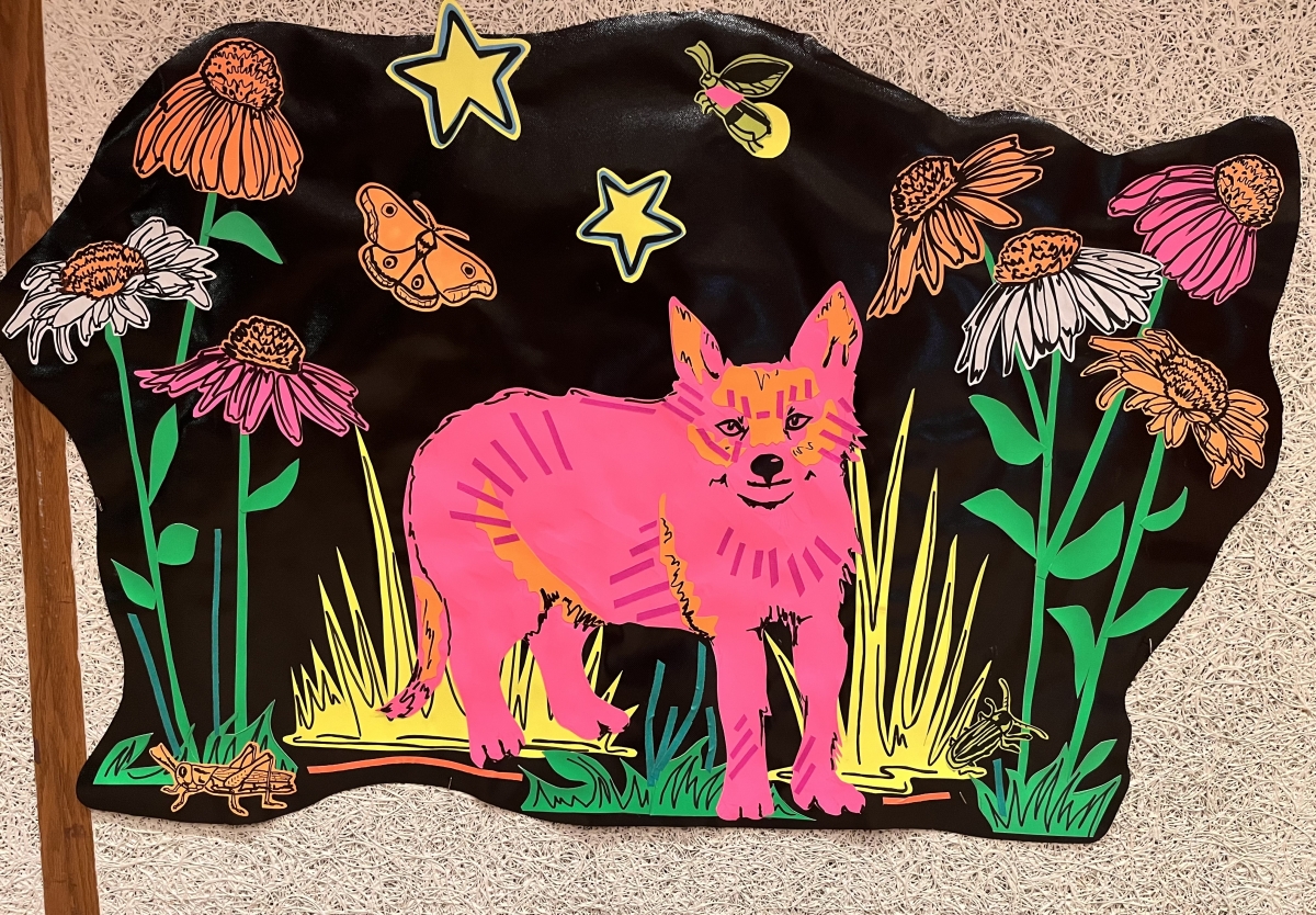 We have a neon display of a forest that lights up in the dark!